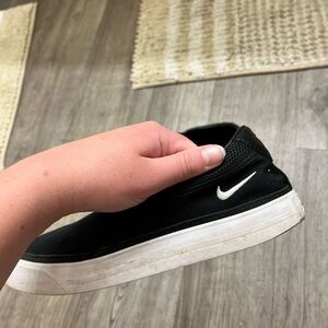 Black Nike slide on shoes
